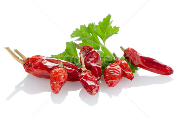 Red chili or chilli pepper and parsley leaves Stock photo © homydesign