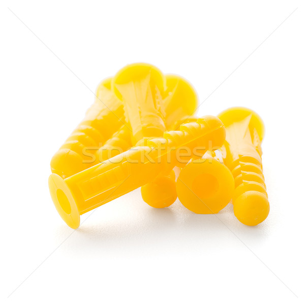 Yellow plastic dowels Stock photo © homydesign