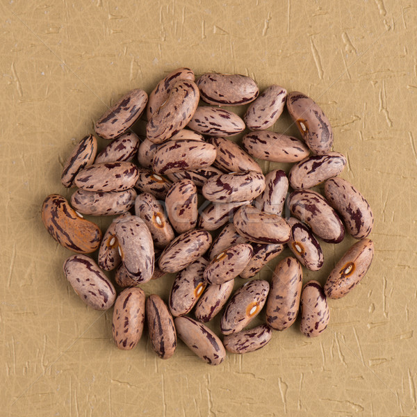 Circle of pinto beans Stock photo © homydesign
