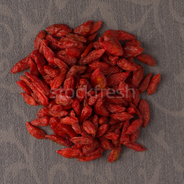 Circle of dry red goji berries Stock photo © homydesign