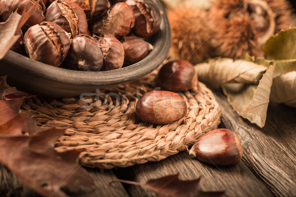 Roasted chestnuts and leaves Stock photo © homydesign