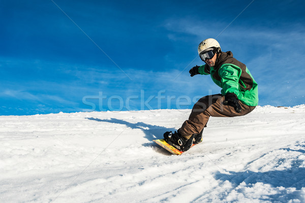 Snowboard freerider in the mountains Stock photo © homydesign