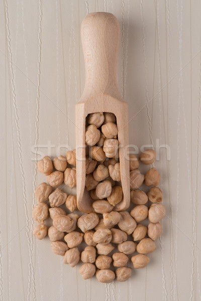 Wooden scoop with chickpeas Stock photo © homydesign