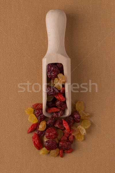 Wooden scoop with mixed dried fruits Stock photo © homydesign