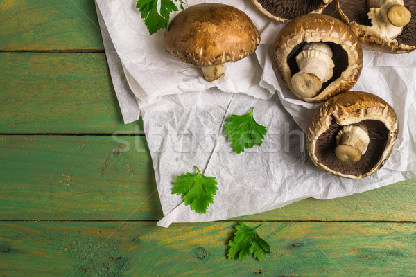 Fresh uncooked brown mushrooms Stock photo © homydesign