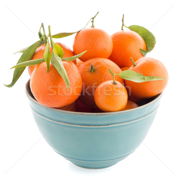 Tangerines on ceramic blue bowl  Stock photo © homydesign