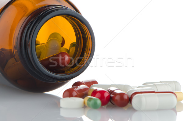 Foto stock: Pílulas · garrafa · branco · médico · vidro · estúdio