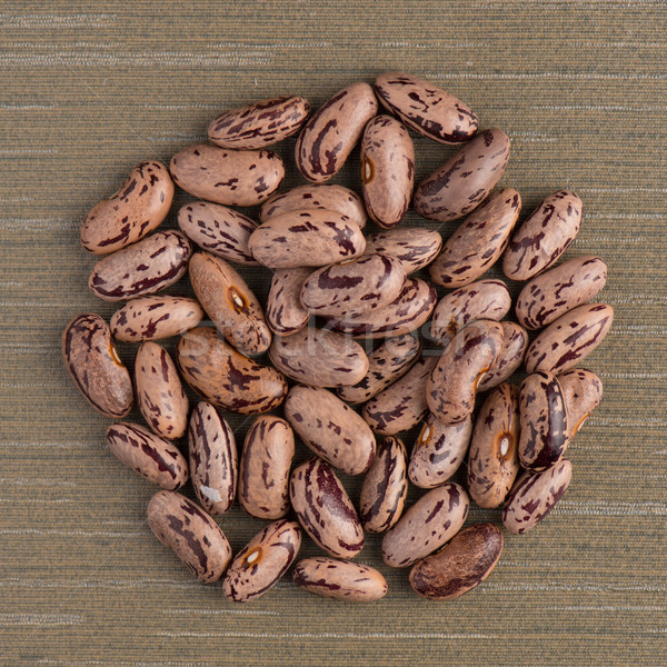 Circle of pinto beans Stock photo © homydesign