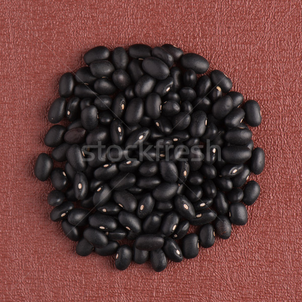 Circle of black beans Stock photo © homydesign