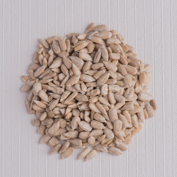 Circle of shelled sunflower seeds Stock photo © homydesign