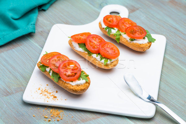 Bruschetta süzme peynir domates hizmet beyaz gıda Stok fotoğraf © homydesign