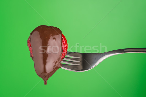 Strawberry and chocolate on a fork Stock photo © homydesign