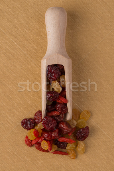 Wooden scoop with mixed dried fruits Stock photo © homydesign