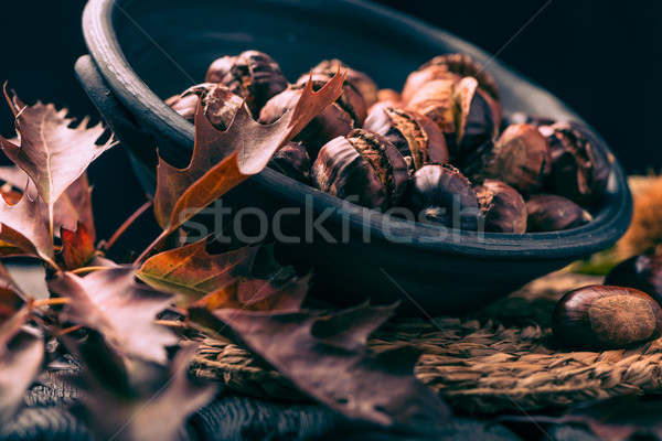 Stock photo: Roasted chestnuts and leaves