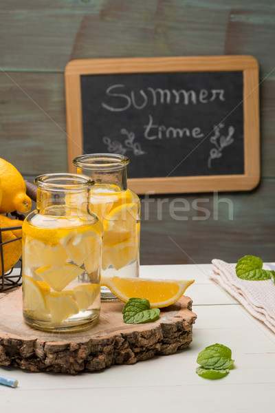 Lemon and lime slices in jars Stock photo © homydesign