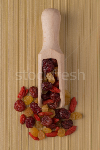 Wooden scoop with mixed dried fruits Stock photo © homydesign
