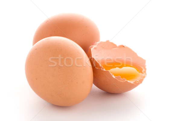 Raw eggs isolated on white Stock photo © homydesign