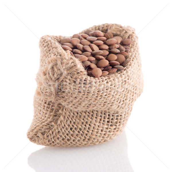 Burlap bag with lentils Stock photo © homydesign