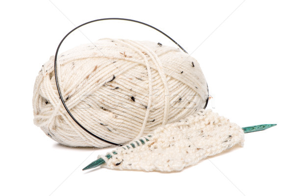 Stock photo: Beige knitting wool with needles