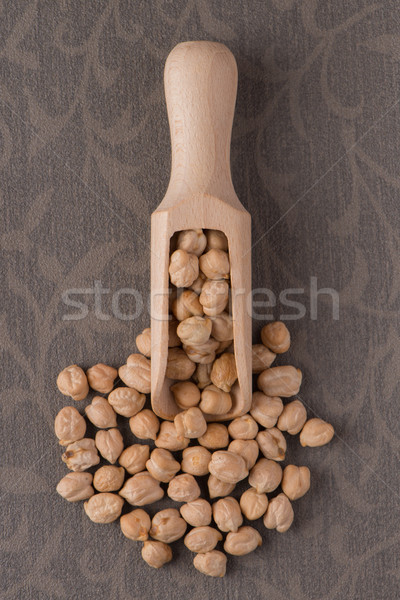 Wooden scoop with chickpeas Stock photo © homydesign