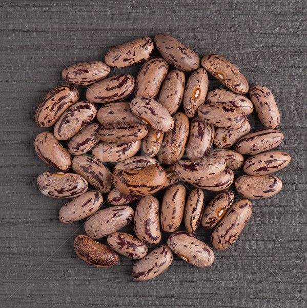 Circle of pinto beans Stock photo © homydesign