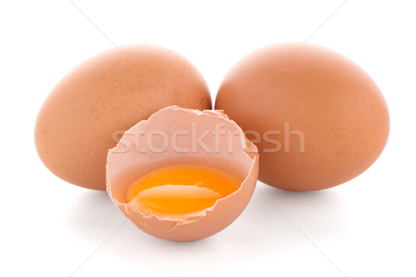 Raw eggs isolated on white Stock photo © homydesign