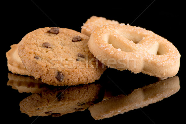 Butter cookies on black Stock photo © homydesign