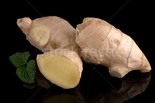 Ginger root on black Stock photo © homydesign