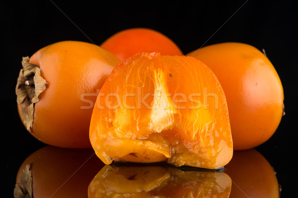 Persimmon vruchten zwarte natuur vruchten gezondheid Stockfoto © homydesign