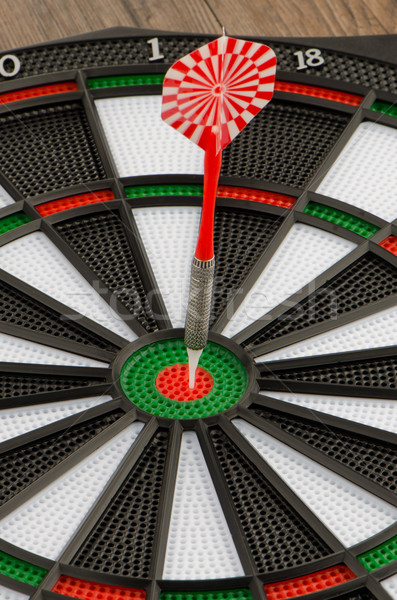 Stock photo: Dart board with dart