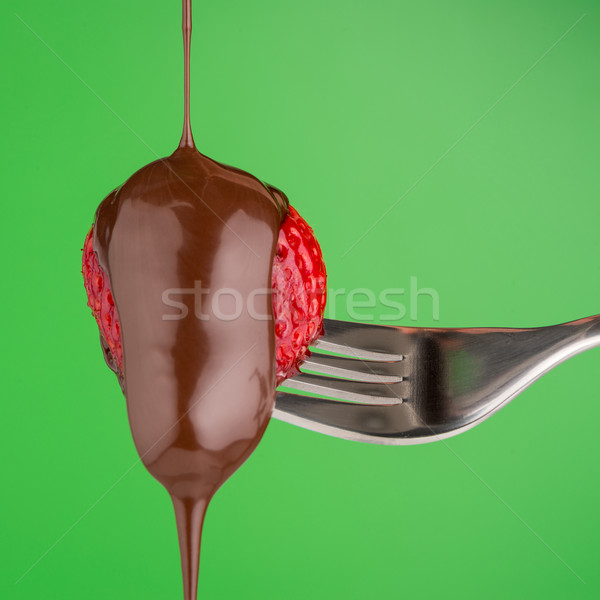 Strawberry and chocolate on a fork Stock photo © homydesign