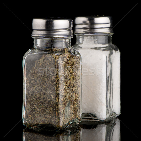 Stock photo:  Salt and oregano shakers