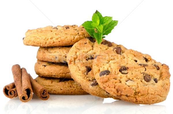 Tasty oat biscuits with cinnamon sticks Stock photo © homydesign