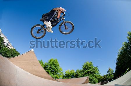 BMX Bike Stunt tail whip Stock photo © homydesign