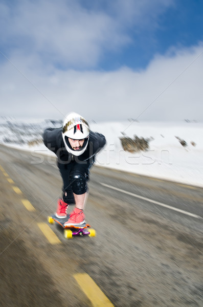 Downhill skateboarder in action Stock photo © homydesign