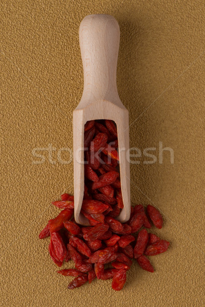 Wooden scoop with dry red goji berries Stock photo © homydesign