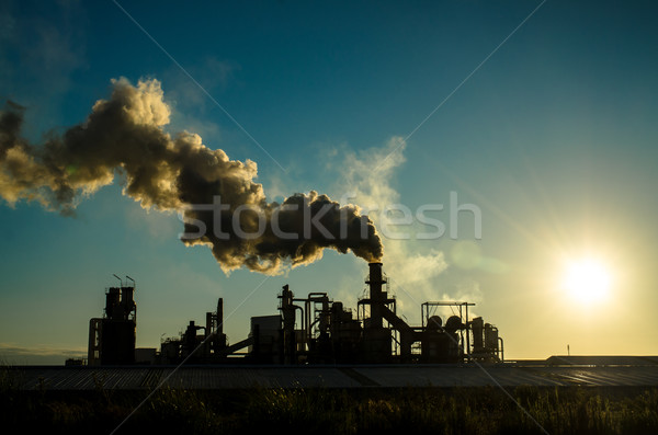 Fumer cheminée coucher du soleil industrielle bâtiments complexe [[stock_photo]] © homydesign