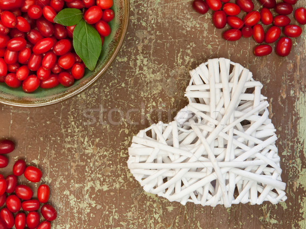 Berries and white colored heart shape Stock photo © hraska