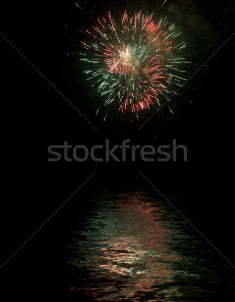 Fireworks with reflexes on water Stock photo © hsfelix