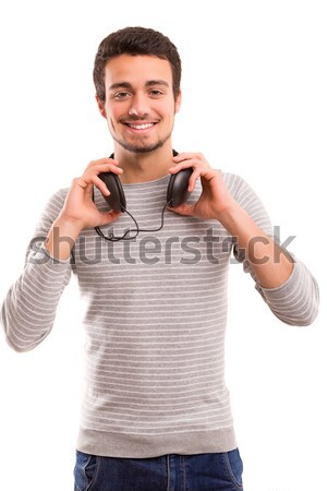 Hombre escuchar música feliz joven auriculares cara Foto stock © hsfelix