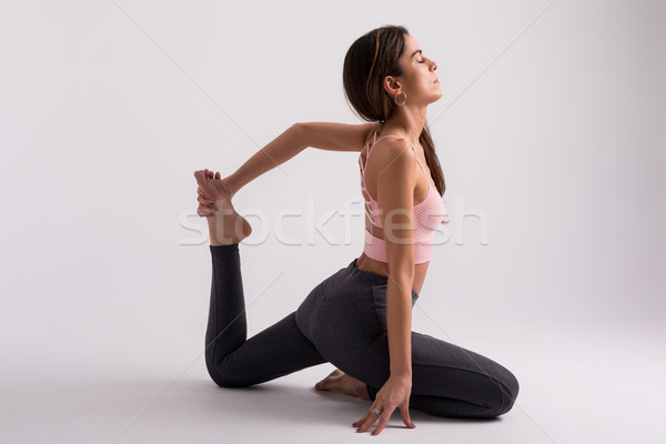 Yoga jeune femme pratique isolé blanche [[stock_photo]] © hsfelix