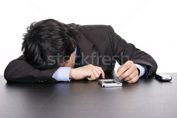 Jóvenes hombre de negocios dormir escritorio aislado blanco Foto stock © hsfelix