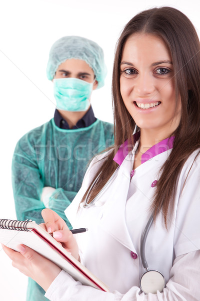 Jóvenes enfermera médico aislado blanco mano Foto stock © hsfelix