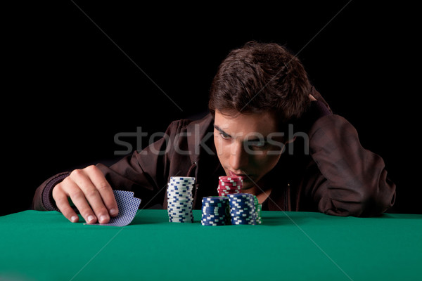Uomo giovani bell'uomo giocare Texas soldi Foto d'archivio © hsfelix