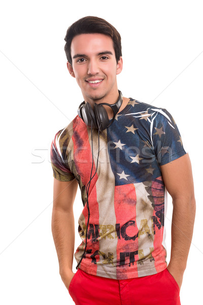 Hombre escuchar música feliz joven auriculares sonrisa Foto stock © hsfelix