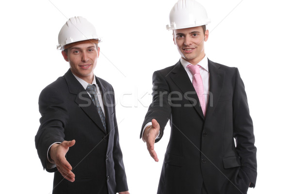 Stock photo: Business team, offering to shake hands