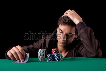 Woman playing poker Stock photo © hsfelix
