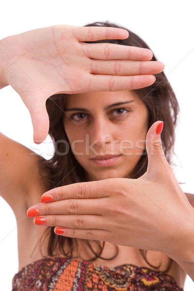 Young woman showing framing hand gesture Stock photo © hsfelix