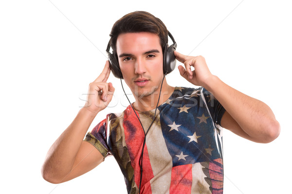 Hombre escuchar música feliz joven auriculares cara Foto stock © hsfelix