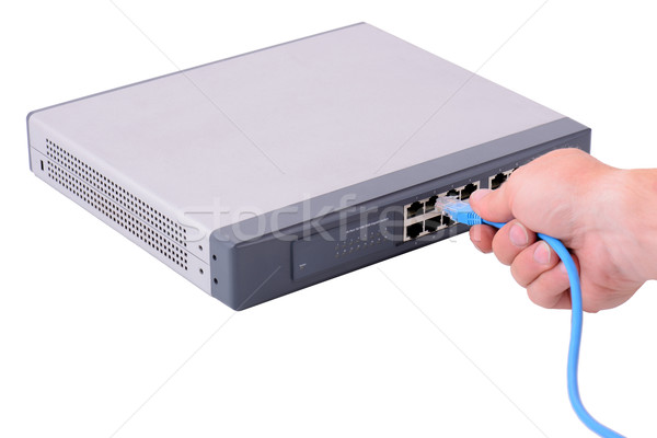 Netwerk schakelaar hand naaf computer kabel Stockfoto © hyrons